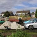 Stone Chippings and Trailor on the Car Park